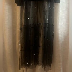 Woman’s mesh pearl top